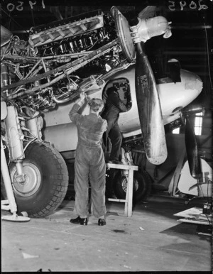 Two men working on engines at Woodbourne Air Force Base, Blenheim