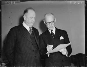 Hon William Sullivan signing immigration agreement at Parliament