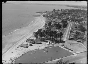 Milford Beach, North Shore, Auckland, showing swimming pool, beach and houses
