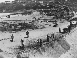 Creator unknown : Photograph of workers on sand dunes at Lyall Bay, Wellington
