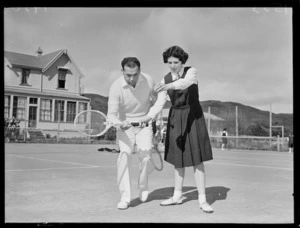 Tennis coach and pupil at Samuel Marsden School