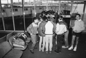 Pupils of Evans Bay Intermediate School playing Space Invaders game at Wellington ferry terminal