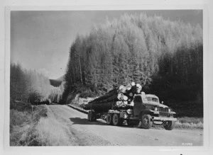 Truck transporting logs - Photographer unidentified
