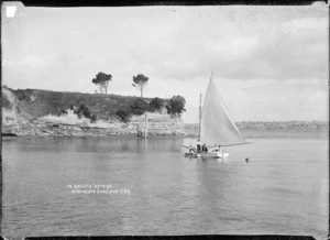 Men sailing a boat at Northcote, Auckland