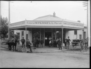 Group by the Wanganui shop of William Parnell - Photograph taken by Frank Denton