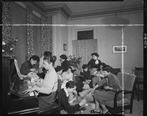 Group in the lounge of Pendennis Maori Girls' Hostel, Wellington - Photograph taken by T Ransfield