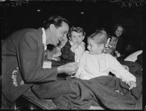 Man with children at Kiwi Concert Party concert