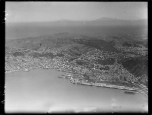 Aerial view of Wellington Harbour, the wharves, city and suburbs