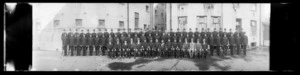 Group portrait of uniformed policemen standing to attention. 1927