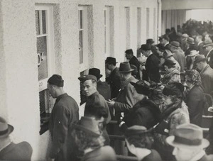 Soldiers and civilians line up to place bets