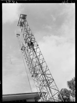 Dismantling flood lights at Hutt Recreation Ground, Lower Hutt