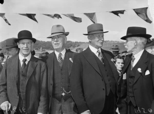Four men at a reunion of Mount Cook School