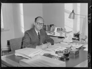 Mr Jack Thomas Watts, Minister of Finance, with the 1956 Budget