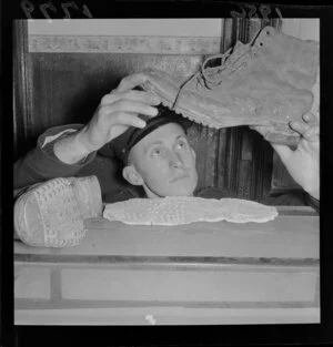Police Officer with boots and a plaster cast for display at the Police Museum
