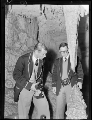 Two unidentified members of the 1956 Springbok rugby union football team at Waitomo Caves
