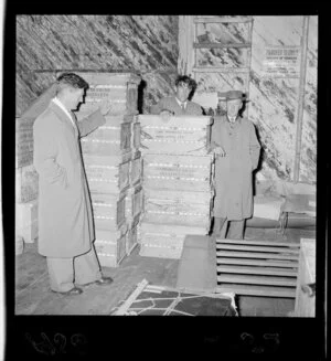 A shipment of eggs before loading for HMNZS Endeavour, with Sir Edmund Hillary, Mr J H Miller and Mr R Cawdrey