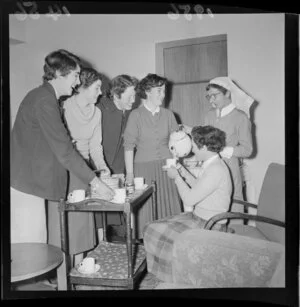 Student nurses enjoy a cup of tea with a head nurse at Wellington hospital