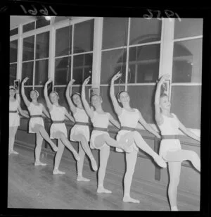 Unidentified girls line up at the barre for a ballet examination