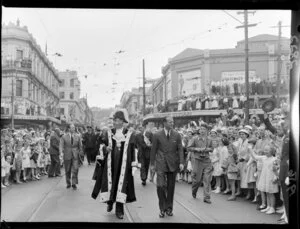 The Mayor of Wellington, Frank Kitts, escorting the Duke of Edinburgh down Cuba Street, Wellington, during the royal visit