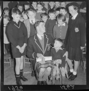 Visiting Otaki Scholar, William Donald, from Robert Gordons College, Aberdeen, Scotland, who wears his school uniform (including kilt), with Kaiwharawhara schoolchildren