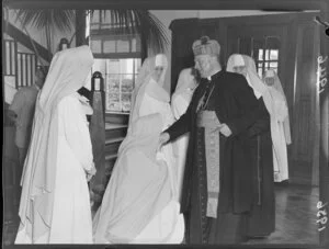 Archbishop Romolo Carboni, Catholic Apostolic delegate, with nuns