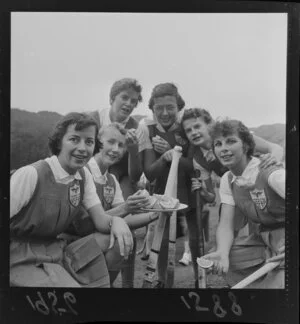 Girls hockey team representing the United States of America huddle around a plate of orange slices, Kaori Park, Wellington