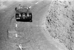 Bob Gibbons in Jaguar XK 120 automobile at Paekakariki hill climb