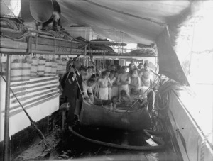 Boys bathing on the ship Amokura