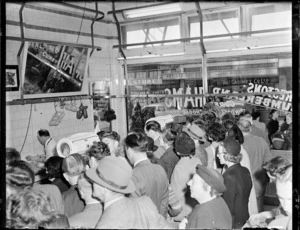 Crowds inside Preston's butcher shop, Willis Street, Wellington