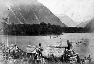 Milford Sound area, shows huts and Donald Sutherland with his dog