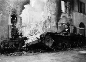 Wrecked German tank amongst ruined buildings, Medicina, Italy, during world War II