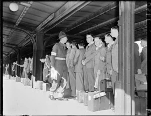 Soldier and young men at Wellington Railway Station
