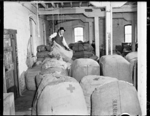 Mr Dahl with bales of clothing
