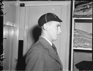 Schoolboy wearing Wellington College cap