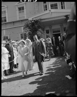 Her Majesty Queen Elizabeth the Queen Mother and the Governor General Viscount Charles John Lyttelton Cobham during a garden party at Government House, Auckland