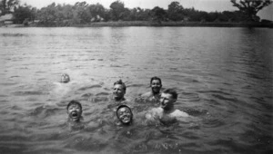 Rewi Alley in the water with other swimmers