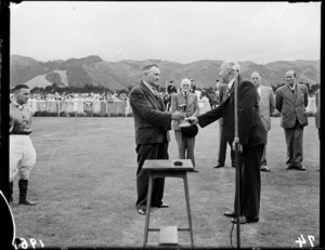 Presentation of Wellington Cup to owner of winning horse, Trentham Racecourse