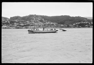Wellington Harbour Board pilot boat with a Royal New Zealand Air Force Catalina flying boat, Evans Bay, Wellington