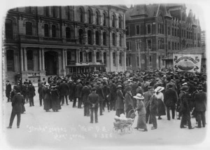 Crowd scene, Wellington, during the 1913 New Zealand Waterfront Strike, with Wellington Waterside Workers Union banner