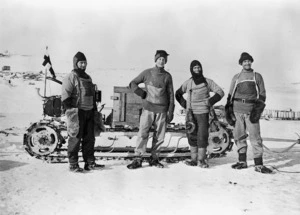 Lieutenant Evans, Bernard Day, W Lashly and F J Hooper with a motorised sled, Antarctica
