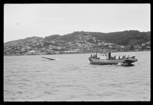 Wellington Harbour pilot boat with a Royal New Zealand Air Force Catalina flying boat, Evans Bay, Wellington