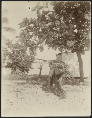 Child carrying a load, Rotuma