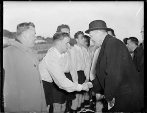 Governor-General greeting soccer team