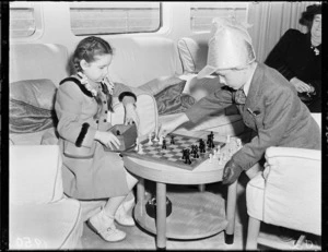 Children, Bryan and Margaret Butler playing chess