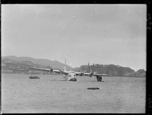 TEAL Solent flying boat Ararangi with missing starboard float after a landing mishap, Evans Bay, Wellington