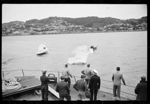 A Royal New Zealand Air Force Catalina flying boat with floating crane, Evans Bay, Wellington