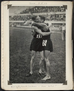 Photograph showing Jack Lovelock being embraced by Luigi Beccali after a race