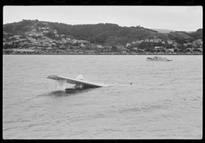 A Royal New Zealand Air Force Catalina flying boat in the sea, Evans Bay, Wellington