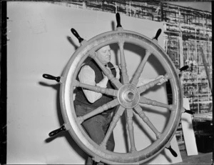Old ship's wheel being painted