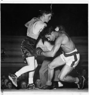 Featherweight boxing match; 15 year old New Zealander Bobby Goslin knocking out American P Gonsalves, in Wellington